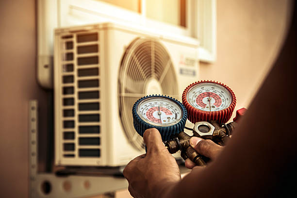 Professional Hvac Maintenance technician working in Lee's Summit, MO